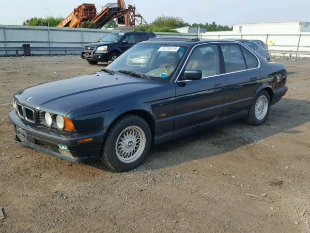 WBAHD6320SGK52362 - 1995 BMW 525 I AUTO GREEN photo 2