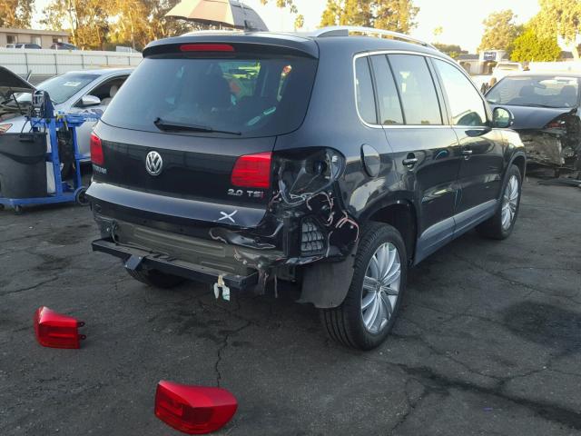 WVGAV7AX7FW516111 - 2015 VOLKSWAGEN TIGUAN S BLACK photo 4