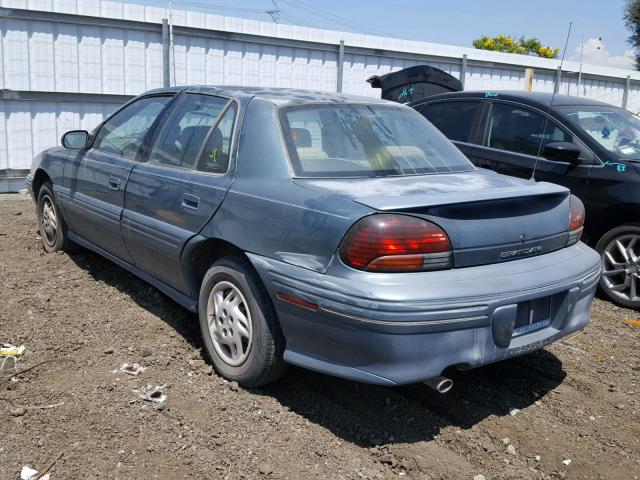 1G2NE52TXVC711453 - 1997 PONTIAC GRAND AM S 绿色 照片 3