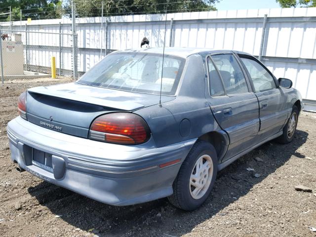 1G2NE52TXVC711453 - 1997 PONTIAC GRAND AM S 绿色 照片 4