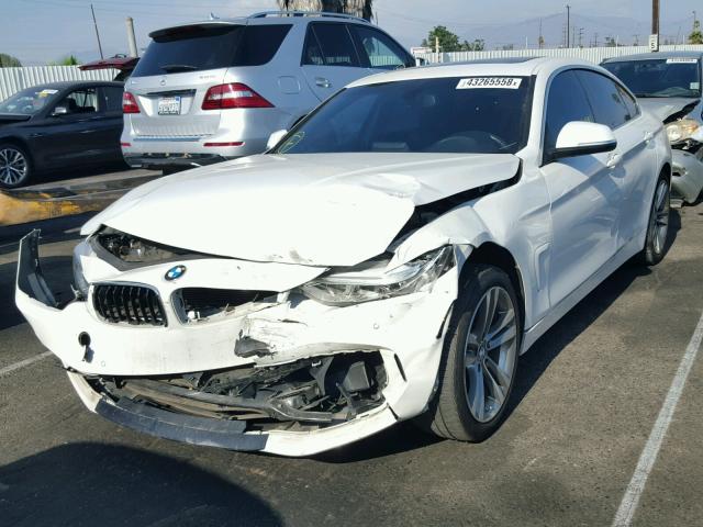 WBA4A9C50GG507117 - 2016 BMW 428 I WHITE photo 2