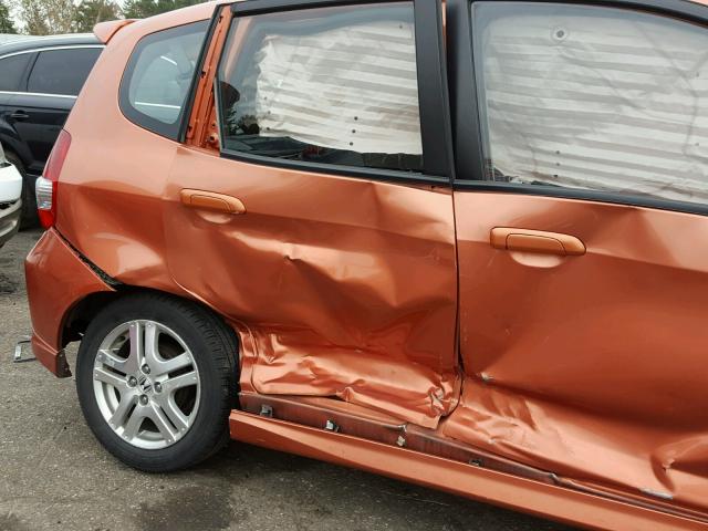 JHMGD38657S021808 - 2007 HONDA FIT ORANGE photo 9