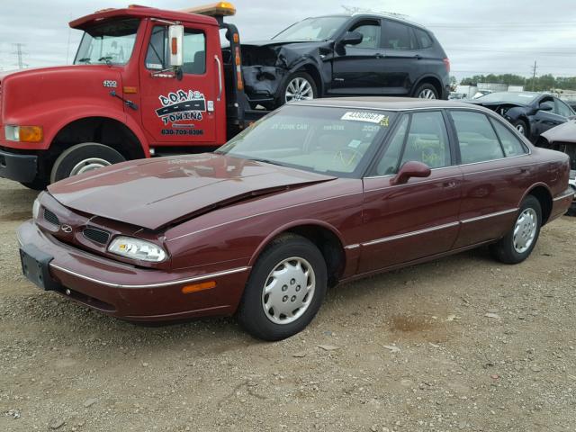 1G3HN52K5X4819394 - 1999 OLDSMOBILE 88 MAROON photo 2