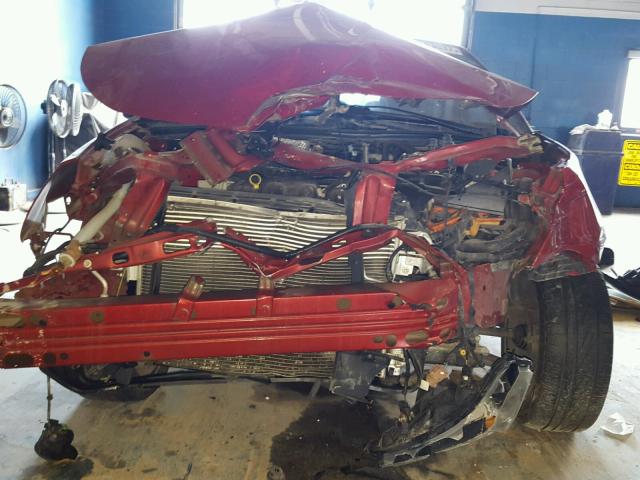 1FAHP3GN0BW184203 - 2011 FORD FOCUS SES RED photo 9