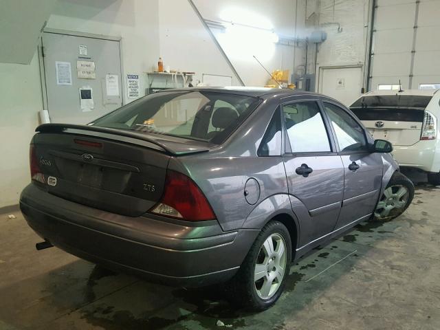 1FAFP38Z94W142995 - 2004 FORD FOCUS ZTS GRAY photo 4