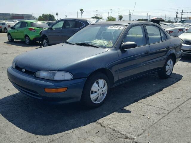 1Y1SK5365RZ069397 - 1994 GEO PRIZM BASE მწვანე ფოტო 2