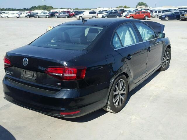 3VWDB7AJ0HM258097 - 2017 VOLKSWAGEN JETTA SE BLACK photo 4