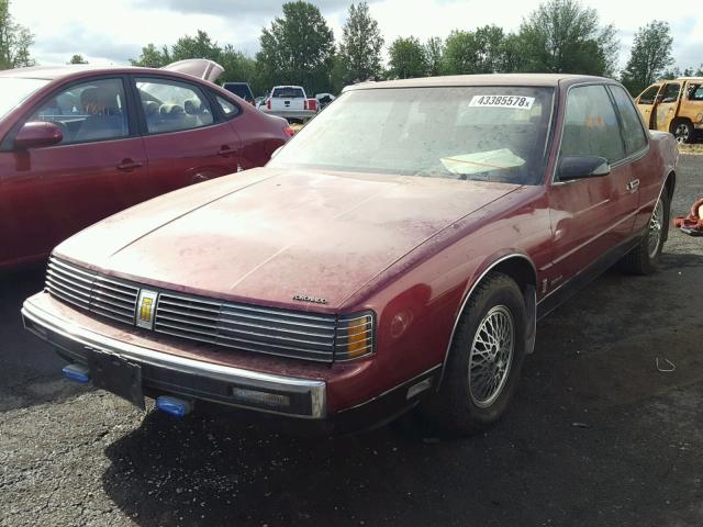 1G3EZ57B8GU313204 - 1986 OLDSMOBILE TORONADO B RED photo 2