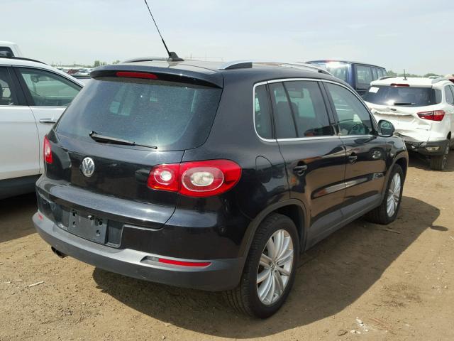 WVGBV95N29W003233 - 2009 VOLKSWAGEN TIGUAN SE BLACK photo 4