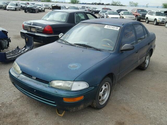 1Y1SK5261TZ065565 - 1996 GEO PRIZM GREEN photo 2