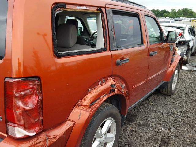 1D8GU58K07W714385 - 2007 DODGE NITRO SLT ORANGE photo 9