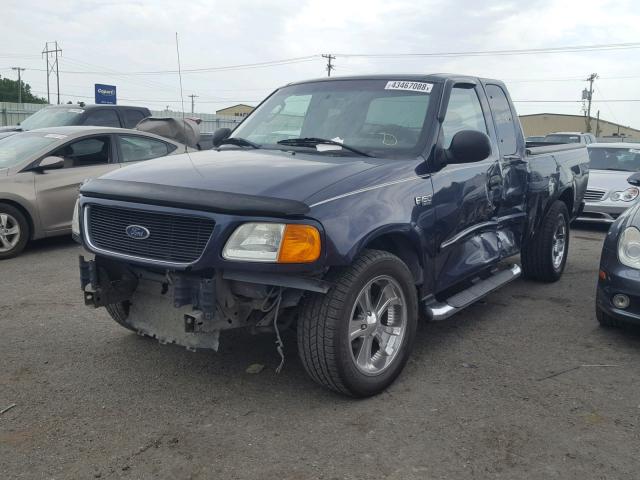 2FTRX17264CA69290 - 2004 FORD F-150 HERI BLUE photo 2