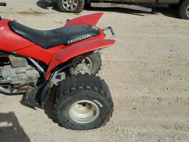 1HFTE270XE4400394 - 2014 HONDA TRX250 X RED photo 6