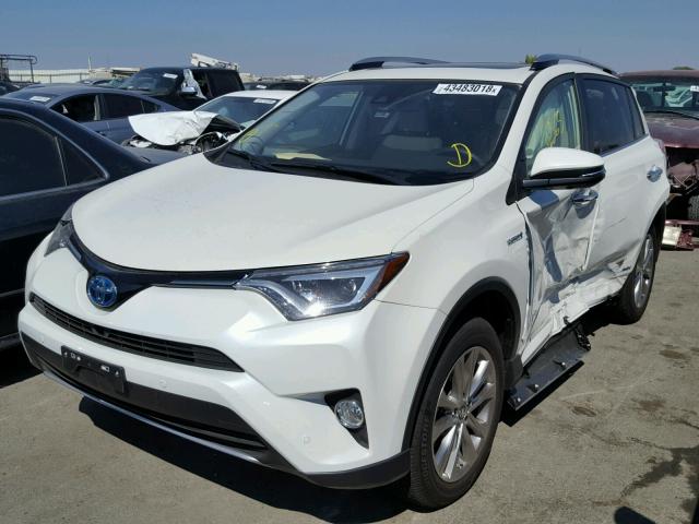 JTMDJREV2JD157420 - 2018 TOYOTA RAV4 HV LI WHITE photo 2