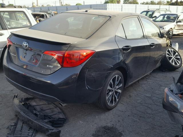 5YFBURHEXHP621247 - 2017 TOYOTA COROLLA L BLACK photo 4