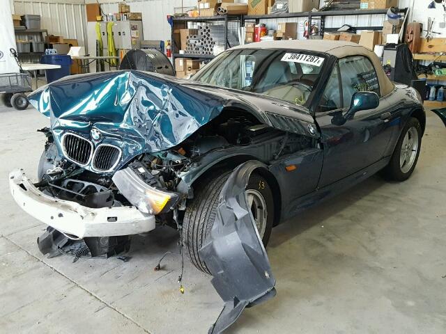 4USCH7323WLD15536 - 1998 BMW Z3 GREEN photo 2