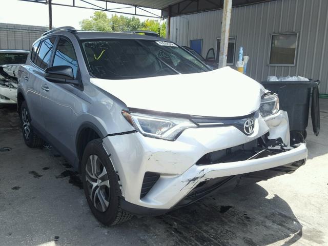 2T3ZFREV8GW302396 - 2016 TOYOTA RAV4 LE SILVER photo 1