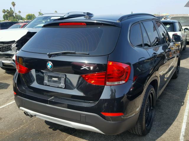 WBAVL1C5XEVY13167 - 2014 BMW X1 XDRIVE2 BLACK photo 4