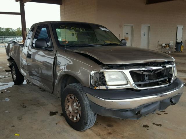 1FTZX17271NB08233 - 2001 FORD F150 GOLD photo 1