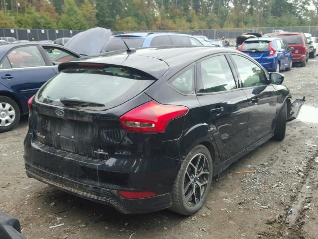 1FADP3K23GL318481 - 2016 FORD FOCUS SE BLACK photo 4