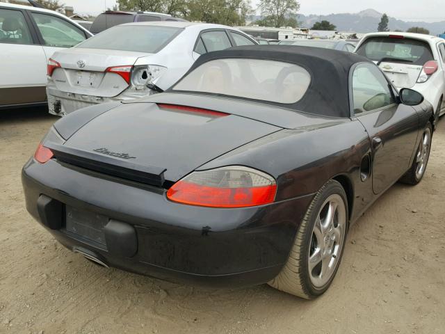 WP0CA2982XU630958 - 1999 PORSCHE BOXSTER BLACK photo 4