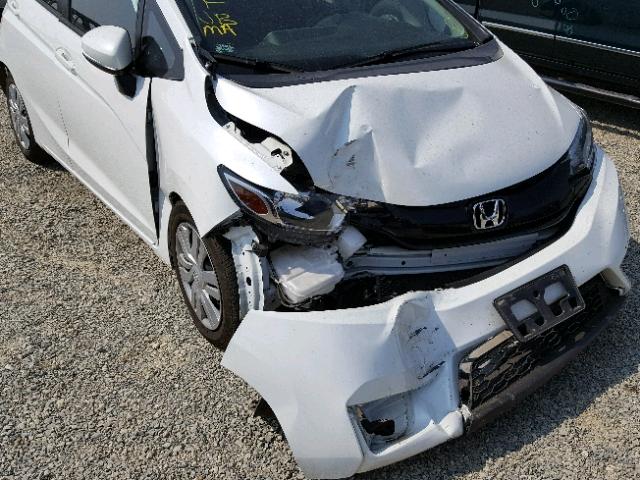 JHMGK5H54GS008704 - 2016 HONDA FIT LX WHITE photo 9