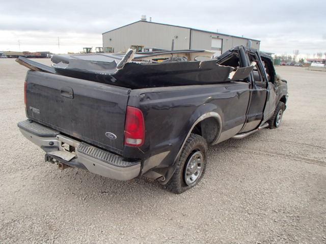 1FTSX31F41EA11967 - 2001 FORD F350 SRW S BLACK photo 4