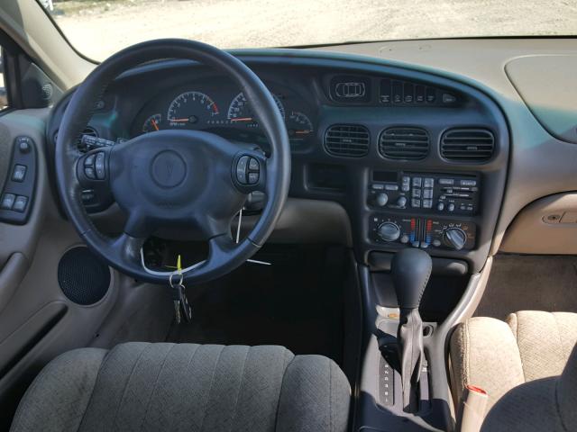 1G2WP12K51F184199 - 2001 PONTIAC GRAND PRIX BROWN photo 9