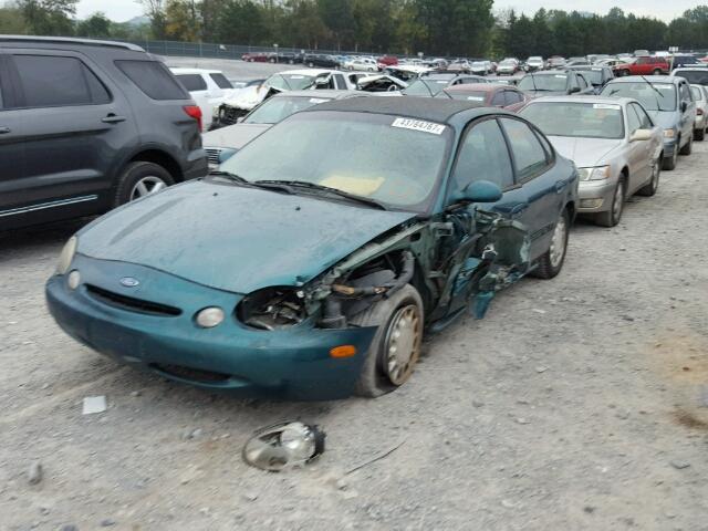 1FALP53SXVA200622 - 1997 FORD TAURUS LX GREEN photo 2