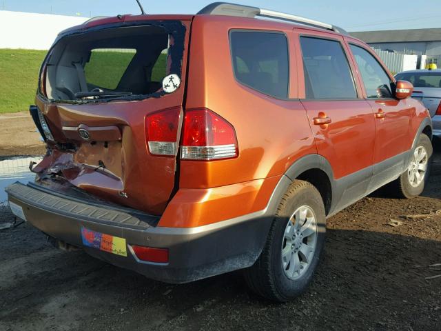 KNDJJ741895011860 - 2009 KIA BORREGO LX ORANGE photo 4