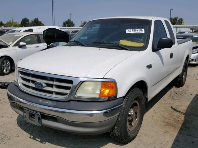 2FTRX17204CA32865 - 2004 FORD F-150 HERI WHITE photo 2