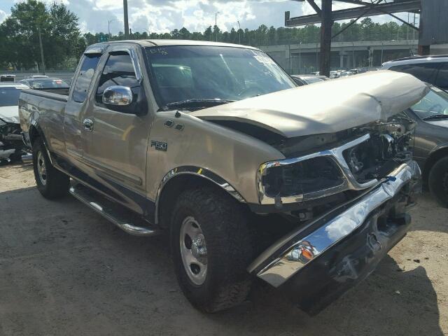 1FTZX1720YNB06219 - 2000 FORD F150 GOLD photo 1