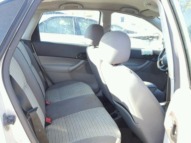 1FAHP34N97W145573 - 2007 FORD FOCUS ZX4 SILVER photo 6