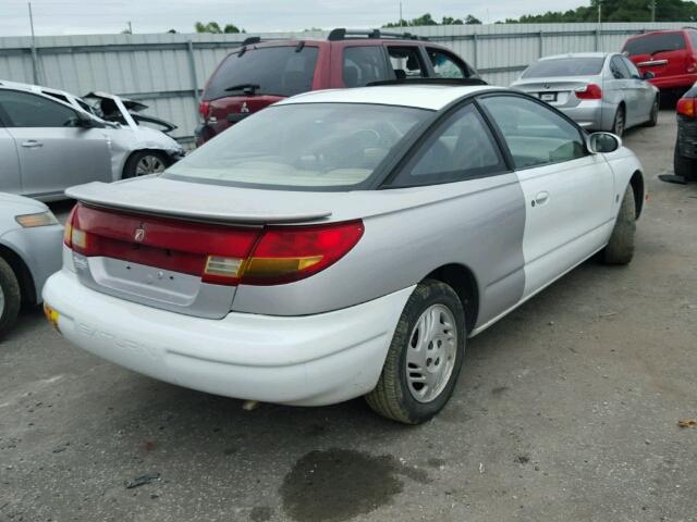 1G8ZH1270XZ179981 - 1999 SATURN SC2 WHITE photo 4