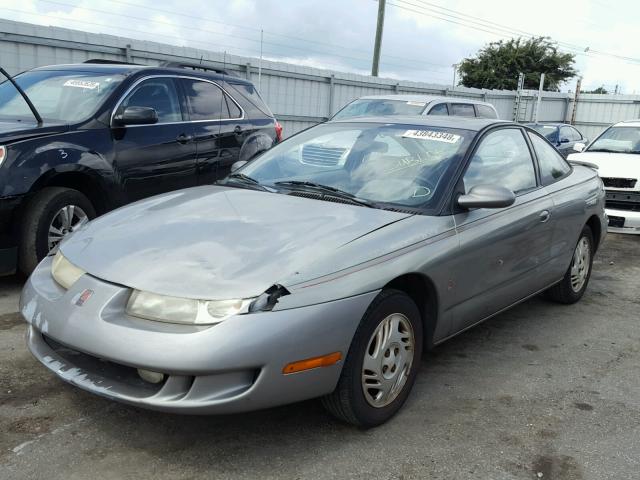 1G8ZG1274XZ199749 - 1999 SATURN SC2 GRAY photo 2