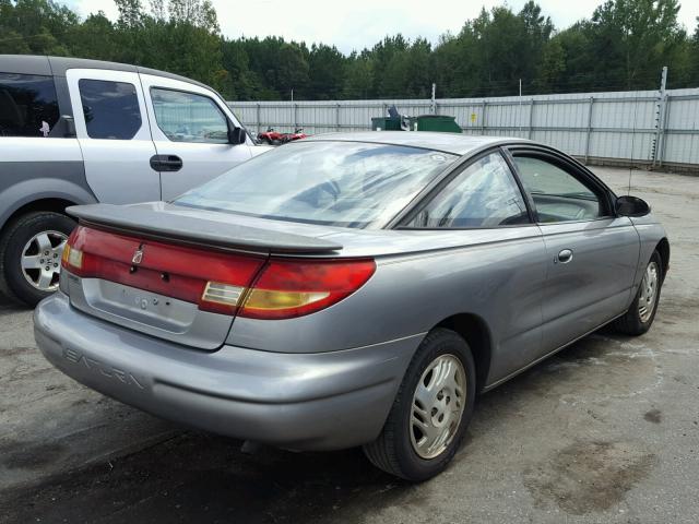 1G8ZG1274XZ199749 - 1999 SATURN SC2 GRAY photo 4