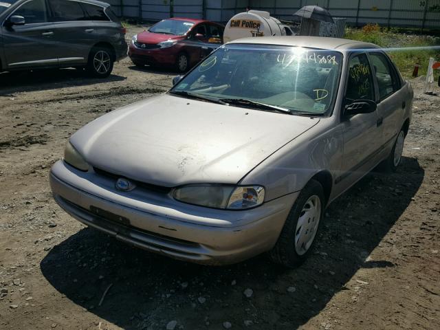 1Y1SK52861Z429994 - 2001 CHEVROLET GEO PRIZM TAN photo 2