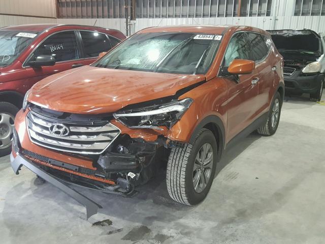 5XYZT3LB7GG368077 - 2016 HYUNDAI SANTA FE S ORANGE photo 2