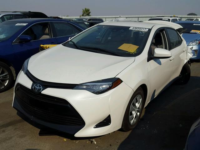 5YFBPRHE9HP679843 - 2017 TOYOTA COROLLA LE WHITE photo 2