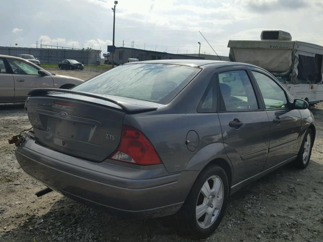 1FAFP38353W113858 - 2003 FORD FOCUS GRAY photo 4