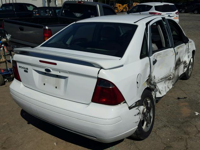 1FAHP34N57W230667 - 2007 FORD FOCUS WHITE photo 4