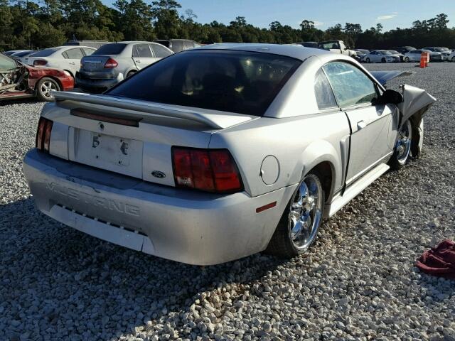 1FAFP4045YF106099 - 2000 FORD MUSTANG SILVER photo 4