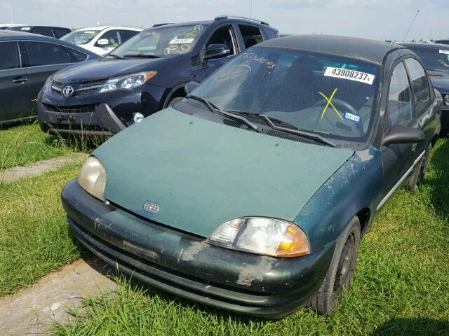 2C1MR522XX6726644 - 1999 CHEVROLET METRO LSI GREEN photo 2