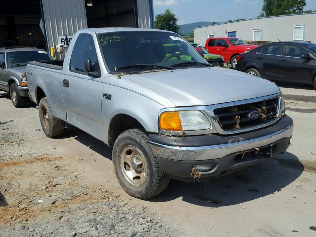 2FTRF18264CA48263 - 2004 FORD F-150 HERI SILVER photo 1