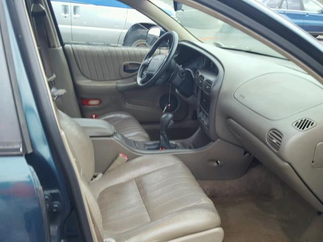 1G2WP521XVF299031 - 1997 PONTIAC GRAND PRIX ტალღისფერი ფოტო 5