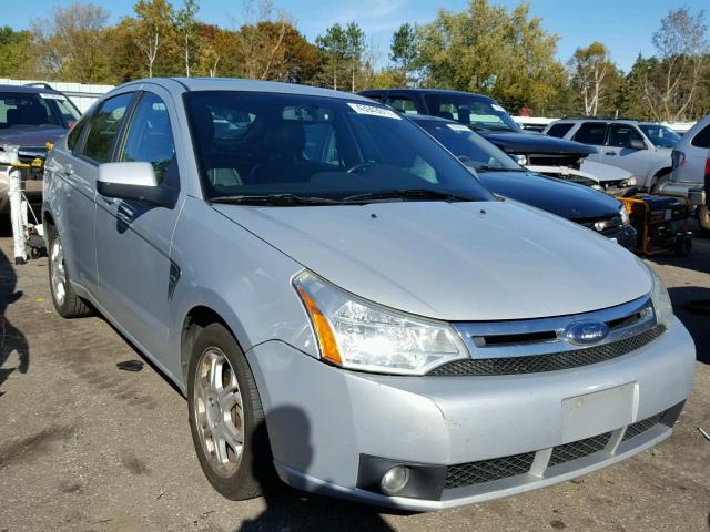 1FAHP35N48W272070 - 2008 FORD FOCUS GRAY photo 1