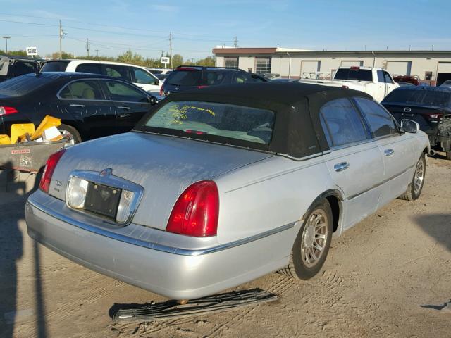 1LNHM82W11Y647903 - 2001 LINCOLN TOWN CAR SILVER photo 4