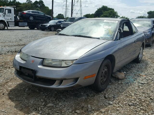 1G8ZP1289XZ317187 - 1999 SATURN SC1 GRAY photo 2