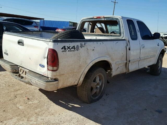 1FTDX1868VKA44058 - 1997 FORD F150 WHITE photo 4