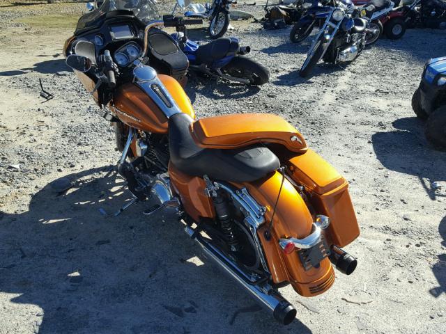 1HD1KTM15FB680329 - 2015 HARLEY-DAVIDSON FLTRXS ROA ORANGE photo 3